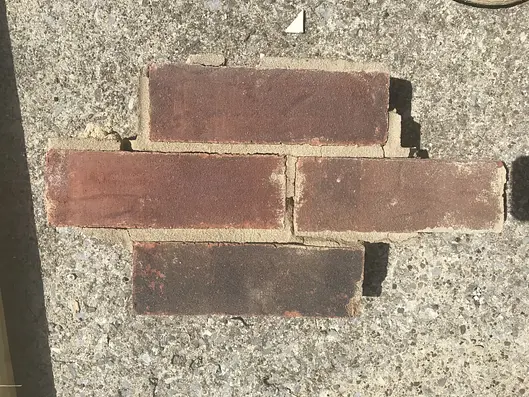 Brick samples used for matching a repair